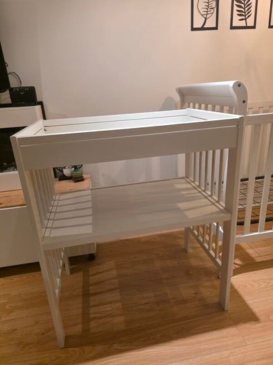 sleigh-style  baby crib and changing table