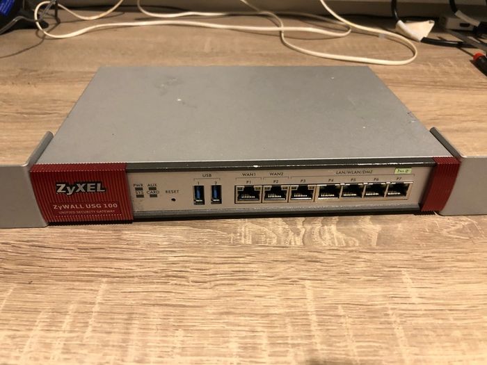 Two ZyXel USG 100 Router/ unified security gateway