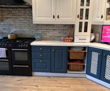 18 kitchen presses , worktop, white sink.
