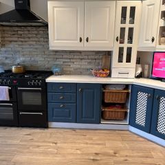 18 kitchen presses , worktop, white sink.