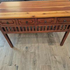 Balinese style wooden hall table with four drawers