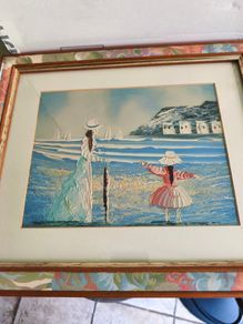 Vintage Small Oil Painting on board framed under glass of lady and child on the beach not signed.