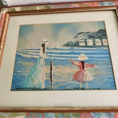 Vintage Small Oil Painting on board framed under glass of lady and child on the beach not signed.