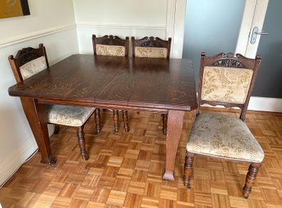 Antique extendable oak table and 4 carved oak chairs