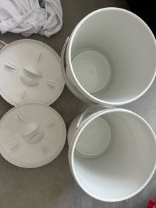 Cloth nappy bins with mesh liners