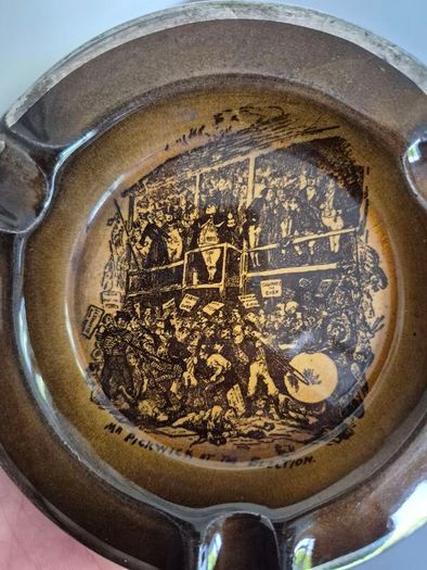 vintage ceramic ashtray featuring a scene titled "Mr Pickwick at the Election" from the Charles Dickens novel The Pickwick Papers