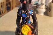 Handmade and Colored African Women Clay Figurines Sculptures .