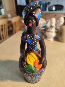 Handmade and Colored African Women Clay Figurines Sculptures .