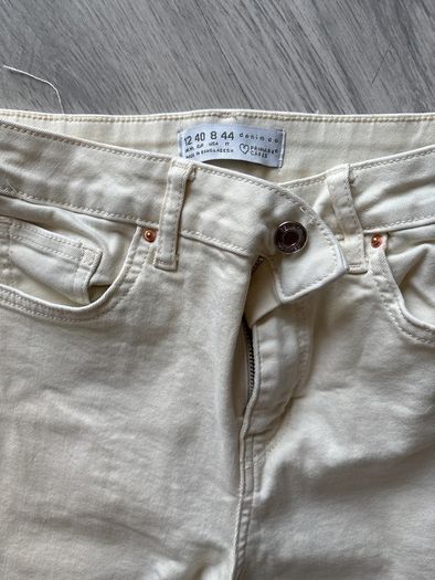 ladies cream skinny jeans