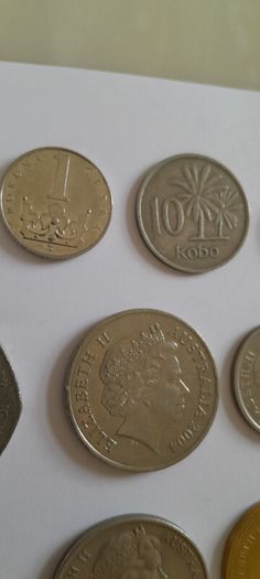 Coins a mix of different countries 28 coins in total registered post included