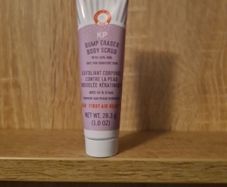 First Aid Beauty KP Bump Eraser Body Scrub with 10% AHA, which is a targeted body treatment formulated to address Keratosis Pilaris (KP)