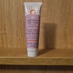 First Aid Beauty KP Bump Eraser Body Scrub with 10% AHA, which is a targeted body treatment formulated to address Keratosis Pilaris (KP)