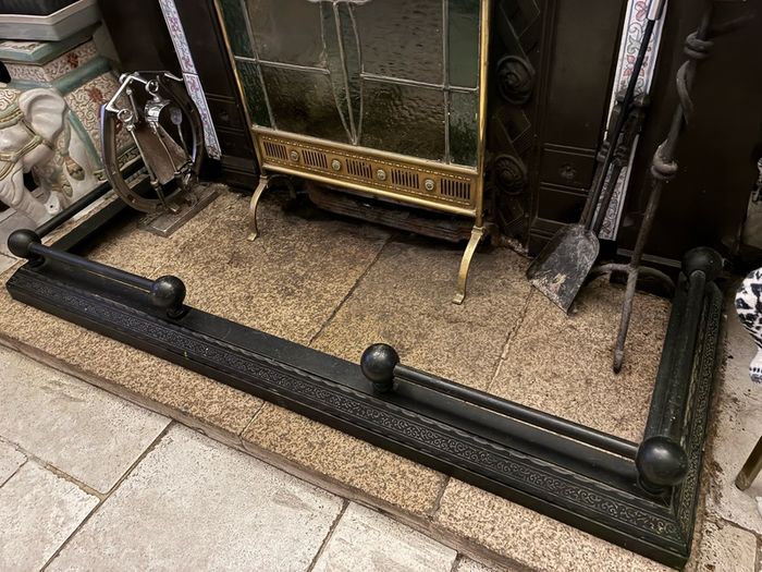 Iron fire fender