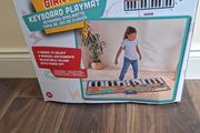 Giant keyboard playmat