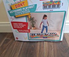 Giant keyboard playmat