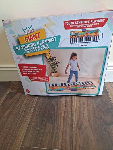 Giant keyboard playmat