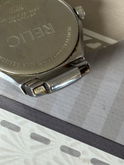 Relic face changing watch with broken watchstrap