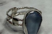 Handmade sterling silver double twist band with blue sea glass. Size Q