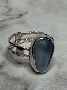Handmade sterling silver double twist band with blue sea glass. Size Q