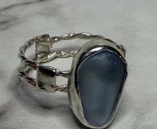 Handmade sterling silver double twist band with blue sea glass. Size Q
