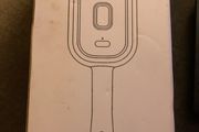 Electric spray comb