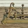Art Nouveau style cast brass hearth fender with a pair of companion tool holders. Image 2