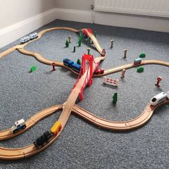 Wooden train set with 5 vehicles and turnstile