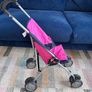 Two toy doll prams and 4 baby dolls Image 2