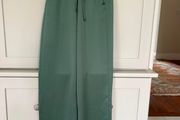 Danish designer Summum loose fit sea green shimmery flowy trousers brand new