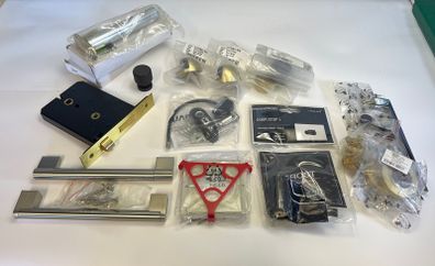 A selection of Door stoppers, Door Lock, Window restrictor and other items.