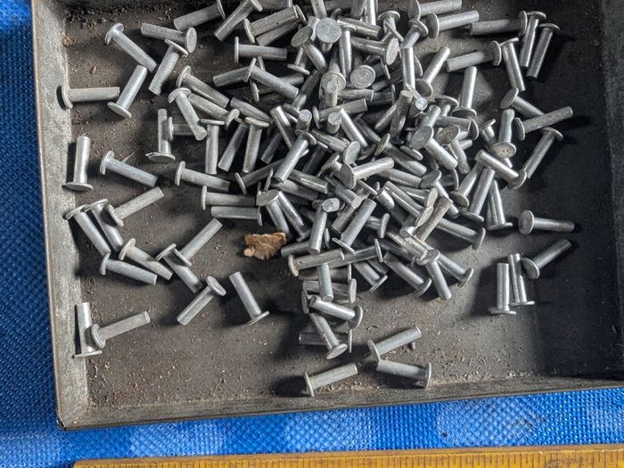 100 Rivets in a Cigarette Tin.