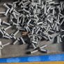 100 Rivets in a Cigarette Tin. Image 2