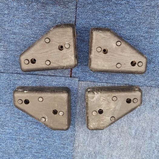 4 black hard plastic  sofa legs