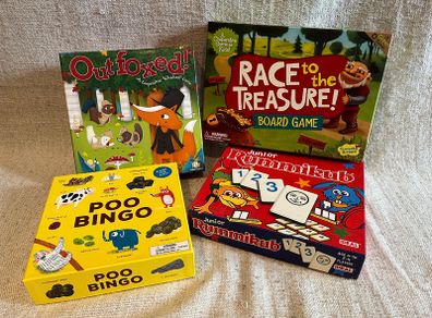4 board games for kids: Poo Bingo, Junior Rummikub & cooperative games Outfoxed, Race to the Treasure