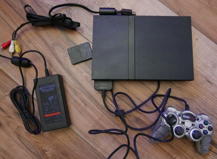 Playstation 2 slim - PS2 slim (works well)