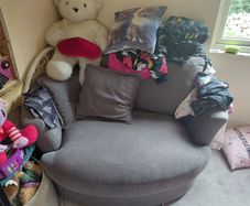 Grey swivel love seat