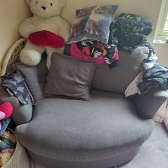 Grey swivel love seat