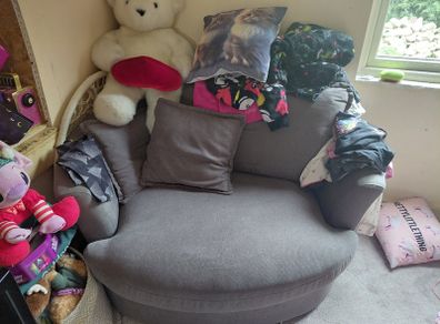 Grey swivel love seat