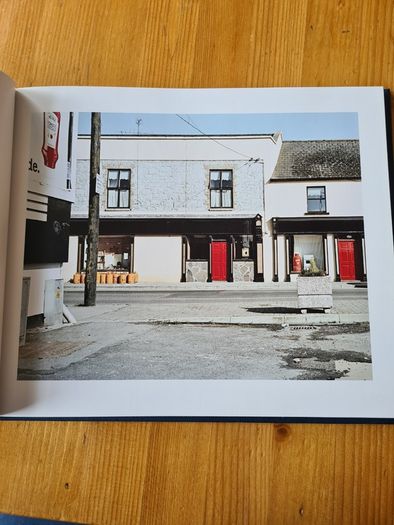 Under A GREY Sky. By Simon Burch. This Book Of Photos  Follows The landscape,people, & Towns Affected By The Collaps Of Board Na Mona's Peat Mining  Industry. IN IRELAND.