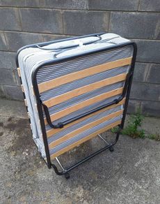 Folding guest bed