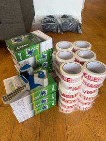 9 x Brand New tape dispensing guns & 36 x rolls of FRAGILE tape