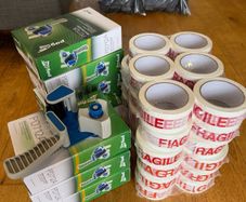 9 x Brand New tape dispensing guns & 36 x rolls of FRAGILE tape