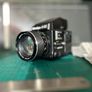Mamiya 645 Super Kit; Near Mint Condition Recently serviced Mamiya 645 Super with Tamron Sekkor 80mm 1.9 lens; Mamiya 645 AE Prism Finder; Mamiya 645 Super Waist Finder Viewer with magnifier; Mamiya 645 Super Motor Power Winder Grip; Darkslide; Extra Film Image 10