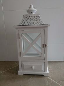 White wooden decorative lantern with drawer