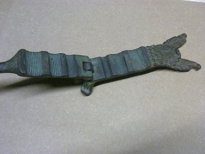 Old ornate cast iron cork presser