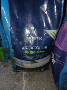 Tile adhesive and grout