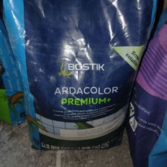 Tile adhesive and grout