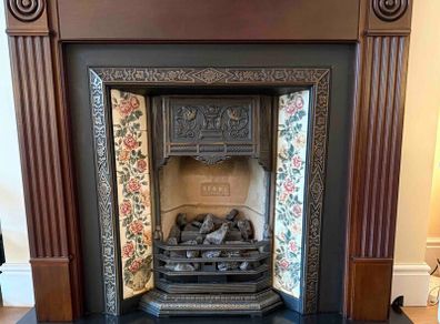 Mohogany Fireplace and coal effect gas fire