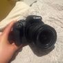 BRAND NEW Canon EOS 2000D with lens and strap Image 4