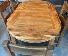 solid oak table and 6 chairs